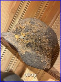 2 german ww2 militaria original helmet from Ardennes Forest 2 german ww2 militaria original helmet from Ardennes Forest