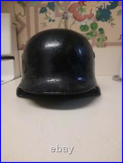 Authentic WWII German Military helmet worn condition Has bullet holes