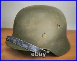 Helmet german original nice helmet M35 size 66 have a number WW2 WWII