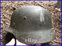 Named German WWII M-42 Combat Helmet Field Camouflage Repaint With SS Insignia