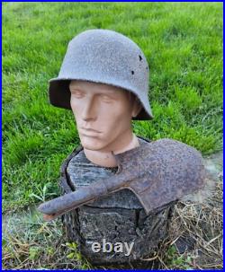 Original German Helmet M40/66 and Sapper Shovel Wehrmacht Uniform World War 2 Original German Helmet M40/66 and Sapper Shovel Wehrmacht Uniform World War 2