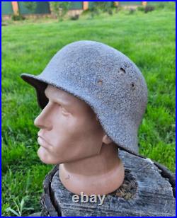 Original German Helmet M40/66 and Sapper Shovel Wehrmacht Uniform World War 2 Original German Helmet M40/66 and Sapper Shovel Wehrmacht Uniform World War 2