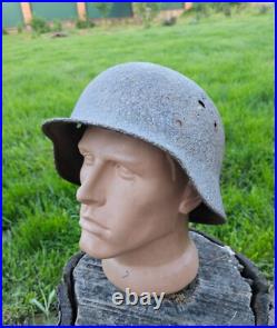 Original German Helmet M40/66 and Sapper Shovel Wehrmacht Uniform World War 2 Original German Helmet M40/66 and Sapper Shovel Wehrmacht Uniform World War 2