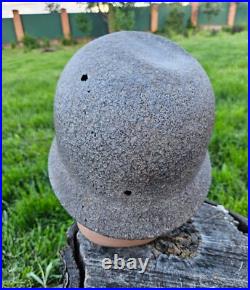 Original German Helmet M40/66 and Sapper Shovel Wehrmacht Uniform World War 2 Original German Helmet M40/66 and Sapper Shovel Wehrmacht Uniform World War 2