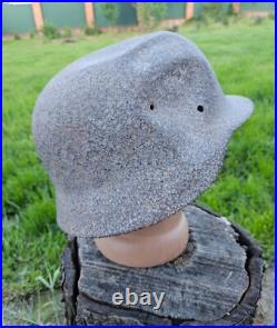 Original German Helmet M40/66 and Sapper Shovel Wehrmacht Uniform World War 2 Original German Helmet M40/66 and Sapper Shovel Wehrmacht Uniform World War 2