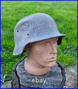 Original German Helmet M40/66 and Sapper Shovel Wehrmacht Uniform World War 2 Original German Helmet M40/66 and Sapper Shovel Wehrmacht Uniform World War 2