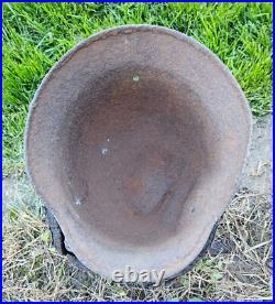 Original German Helmet M40/66 and Sapper Shovel Wehrmacht Uniform World War 2 Original German Helmet M40/66 and Sapper Shovel Wehrmacht Uniform World War 2
