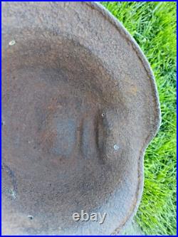 Original German Helmet M40/66 and Sapper Shovel Wehrmacht Uniform World War 2 Original German Helmet M40/66 and Sapper Shovel Wehrmacht Uniform World War 2