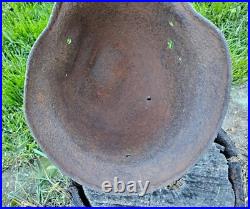 Original German Helmet M40/66 and Sapper Shovel Wehrmacht Uniform World War 2 Original German Helmet M40/66 and Sapper Shovel Wehrmacht Uniform World War 2