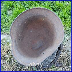 Original German Helmet M40/66 and Sapper Shovel Wehrmacht Uniform World War 2 Original German Helmet M40/66 and Sapper Shovel Wehrmacht Uniform World War 2
