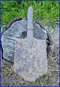 Original German Helmet M40/66 and Sapper Shovel Wehrmacht Uniform World War 2 Original German Helmet M40/66 and Sapper Shovel Wehrmacht Uniform World War 2