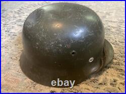 Original German Made M40 Stahlhelm Helmet With Some Battlefield Wear And Damage