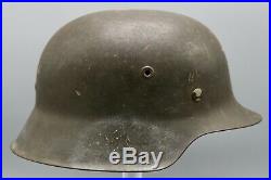 Original German WWII Battle Damaged M42 ND Helmet
