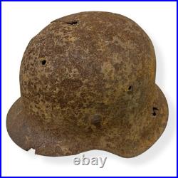 Original German WWII M42 Helmet with Bullet Hole Damage