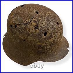 Original German WWII M42 Helmet with Bullet Hole Damage