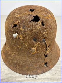 Original German WWII M42 Helmet with Bullet Hole Damage
