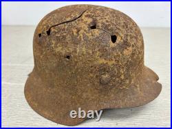 Original German WWII M42 Helmet with Bullet Hole Damage