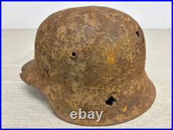 Original German WWII M42 Helmet with Bullet Hole Damage