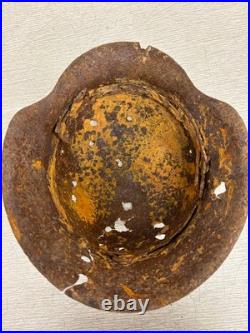 Original German WWII M42 Helmet with Bullet Hole Damage