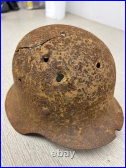 Original German WWII M42 Helmet with Bullet Hole Damage
