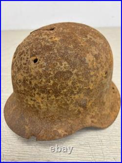 Original German WWII M42 Helmet with Bullet Hole Damage