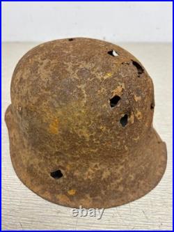 Original German WWII M42 Helmet with Bullet Hole Damage