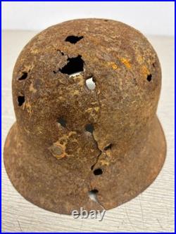 Original German WWII M42 Helmet with Bullet Hole Damage