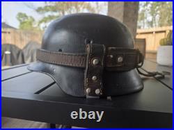 Original WW II m40 Helmet with Leather Strap hand made for a german soldier