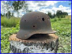 Original WW2 German M40 Battle Damaged Helmet