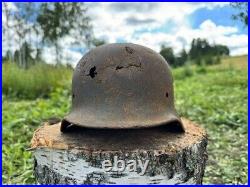 Original WW2 German M40 Battle Damaged Helmet