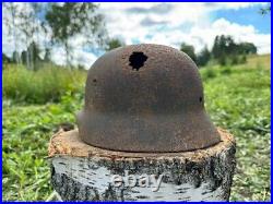 Original WW2 German M40 Battle Damaged Helmet