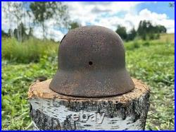 Original WW2 German M40 Battle Damaged Helmet