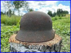 Original WW2 German M40 Battle Damaged Helmet