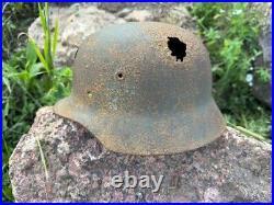 Original WW2 German M40 Battle Damaged Helmet