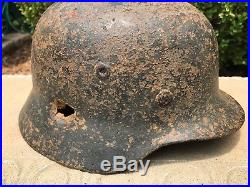 Original WWII German M40 Combat Helmet SD Heer Relic with Battle Damage