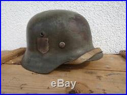 Original WWII German SS M35 Helmet with original helmet liner and strap RRR