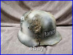 Original war damaged M-40 German Helmet + Handmade Art, Varnished