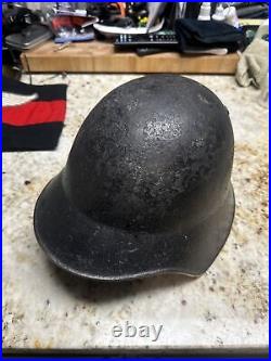 Swiss M18 Helmet WWII And A German Car Flag