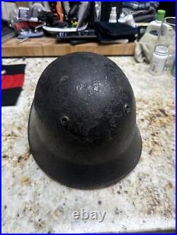 Swiss M18 Helmet WWII And A German Car Flag