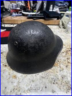 Swiss M18 Helmet WWII And A German Car Flag