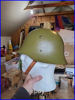 WW I or WWII GERMAN HELMET green leather