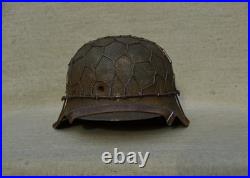 WW II WW2 German Helmet M42 ckl 66. Sawdust