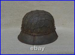 WW II WW2 German Helmet M42 ckl 66. Sawdust