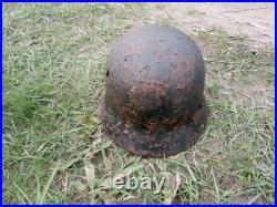 WW II WW2 Original German M40 helmet from the battlefield of Kurland pocket