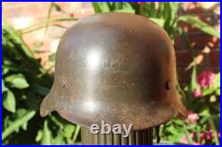 WW2 German Army Helmet M42 in very good condition, paint, pins, Normandy found WW2 German Army Helmet M42 in very good condition, paint, pins, Normandy found