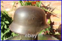 WW2 German Army Helmet M42 in very good condition, paint, pins, Normandy found WW2 German Army Helmet M42 in very good condition, paint, pins, Normandy found