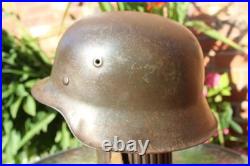 WW2 German Army Helmet M42 in very good condition, paint, pins, Normandy found WW2 German Army Helmet M42 in very good condition, paint, pins, Normandy found