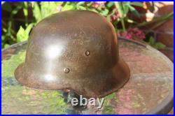 WW2 German Army Helmet M42 in very good condition, paint, pins, Normandy found WW2 German Army Helmet M42 in very good condition, paint, pins, Normandy found