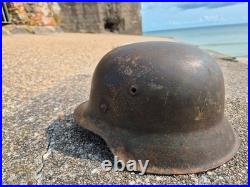 WW2 German Army Helmet M42 in very good condition, paint, pins, Normandy found WW2 German Army Helmet M42 in very good condition, paint, pins, Normandy found