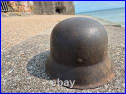 WW2 German Army Helmet M42 in very good condition, paint, pins, Normandy found WW2 German Army Helmet M42 in very good condition, paint, pins, Normandy found